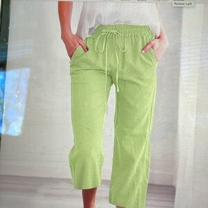Women’s celery green relaxed fit capris, size M.
